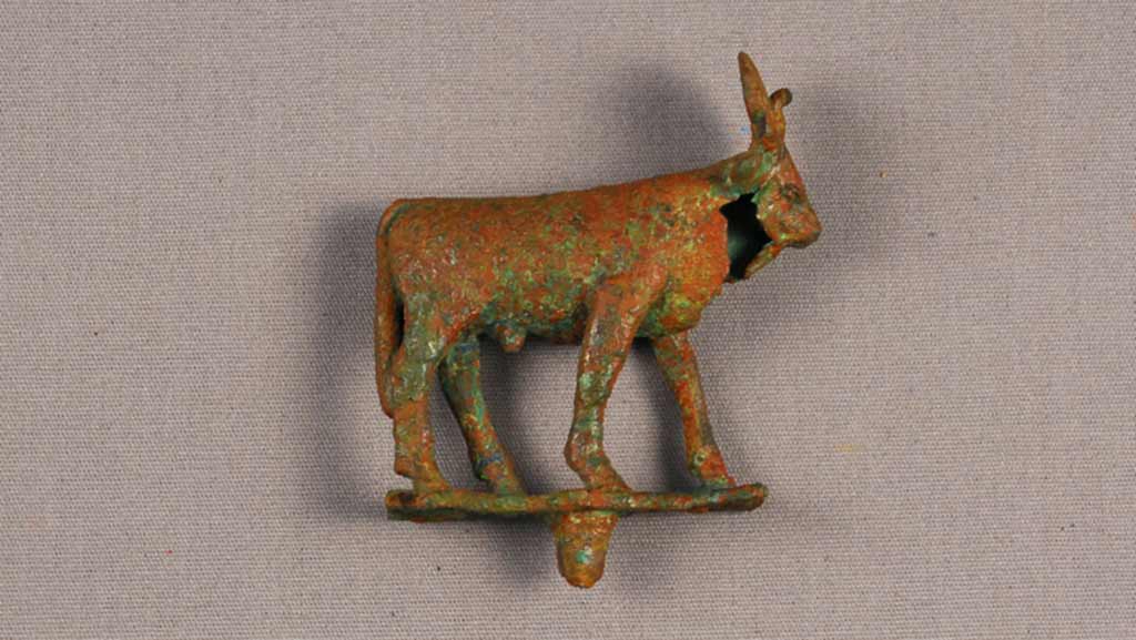 small reddish-brown bull figure