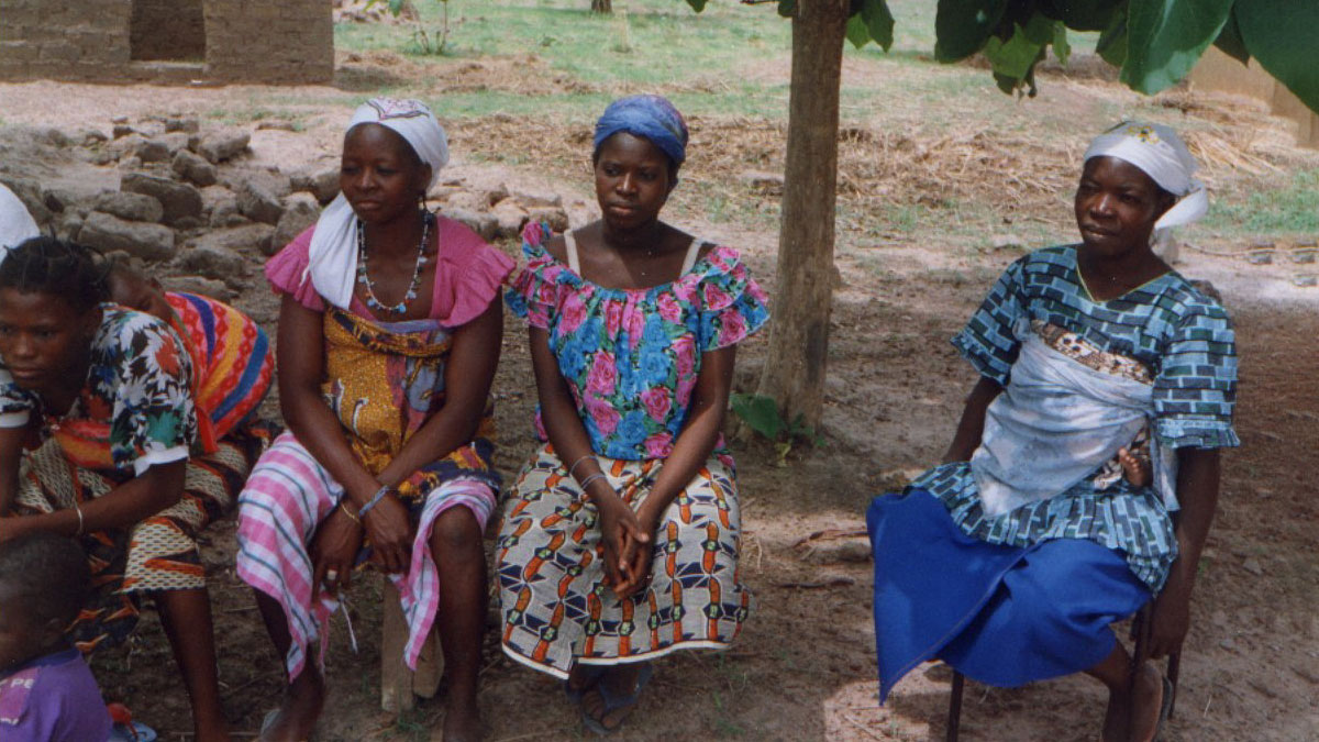 women sitting and listening to a speaker