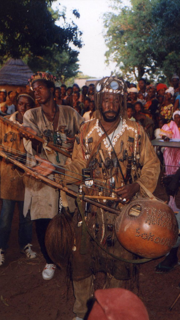 man plays instrument